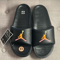 Brand New Nike Air Jordan Break Slide Sandals [Ar6374-008] Black Jumpman Sz 12 Black Slip-resistant Sandals With Round Toe, Slip-resistant Sandals For Streetwear, Flat Non-slip Sandals For Streetwear, Black Flip Flops For Outdoor Use, Black Slip-resistant Flat Sandals, Black Closed Toe Slip-resistant Sandals, Black Rubber Sole Flat Flip Flops, Black Flat Slides For Outdoor, Black Flat Slides With Rubber Sole