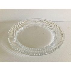 a clear glass plate on a white table