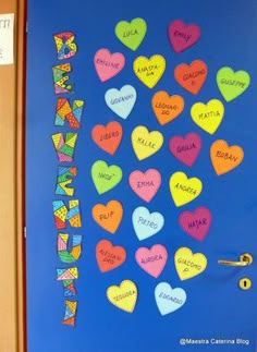 a door decorated with hearts and the word happy written on it