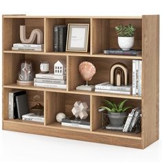 a book shelf filled with books and other items on top of it's sides