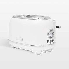 a white toaster sitting on top of a counter