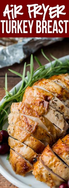 a turkey breast on a white plate with green beans and cranberries in the background