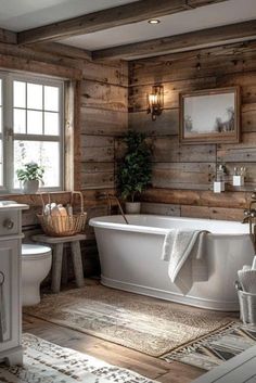 a bathroom with wooden walls and flooring in the middle of it is decorated in rustic style