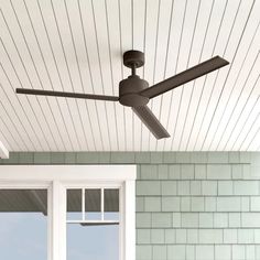 a ceiling fan on the outside of a house