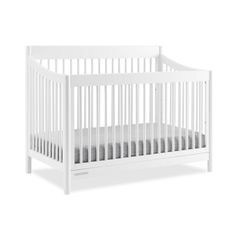 a white crib is shown against a white background with no sheets on the bed