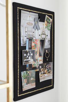 a black and gold frame with pictures on it