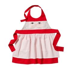 a red and white apron with a santa face on it