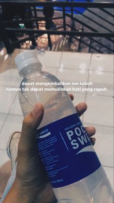 a person holding a bottle of water in their hand with the caption saying, don't sweat