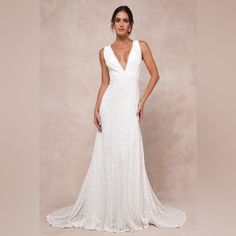 You'll Be A Stunning Vision Of Perfection As You Glide Down The Aisle In The Lulus Infinite Bliss Ivory Lace Sleeveless Backless Trumpet Maxi Dress! Gorgeous, Sheer Floral Lace (Atop A White Knit Liner) Shapes This Romantic Dress That Falls From Wide Straps Into A Plunging, Subtle Surplice Neckline And A Fitted Bodice With An Alluring Open Back Design. The High Waist Sits Atop A Curve-Flattering Maxi Skirt With A Trumpet Silhouette And A Regal Train At Back. Crochet Lace Trim Accents The Straps, Trumpet Silhouette, Lulus Dresses, Crochet Lace Trim, Surplice Neckline, Romantic Dress, Lulu Dresses, Ivory Lace, Wide Straps, Favorite Dress