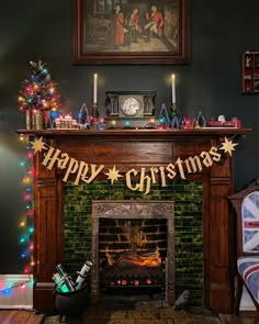 a fireplace decorated for christmas with lights and decorations on it, along with a flag that reads happy christmas