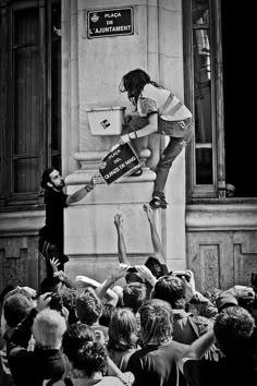 black and white photograph of a person jumping in the air