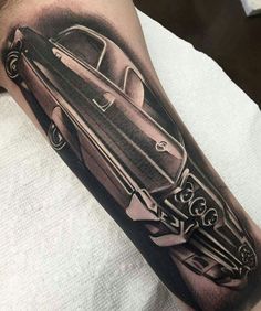 a black and white photo of an old car on the arm, done by person