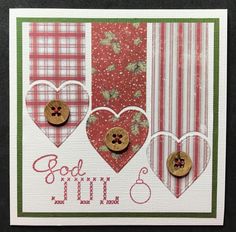 a close up of a greeting card with buttons on the front and two hearts in the back