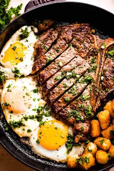 steak, eggs and potatoes in a cast iron skillet