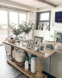 a living room filled with furniture and a fire place