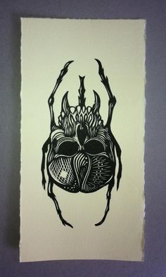 a black and white drawing of a bug