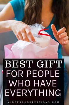 a woman holding a bag with the words best gift for people who have everything