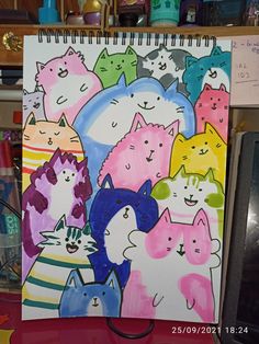 a drawing of many cats in different colors