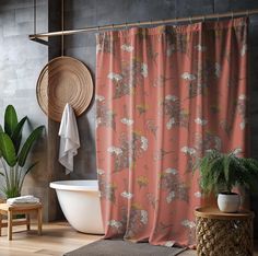 a bath room with a tub and a shower curtain