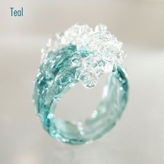 This ocean wave сhunky everyday ring is a textured ring (water glass ring) with a wide band. This waterproof nature inspired ring is an unique mermaidcore gift for scuba diver, surfer (surf jewelry), mermaid, sea and ocean lovers. Please select your preferred color and transparent or opaque ring: - a transparent ring looks more natural, in it the finger shines through the glass as if through the thickness of water. However, due to this, it is less bright compared to an opaque ring. - an opaque r Water Ring, Surfer Jewelry, Wave Jewelry, Ring Wrap, Mermaid Ring, Jewelry Purple, Ocean Jewelry, Magical Jewelry, Glass Ring