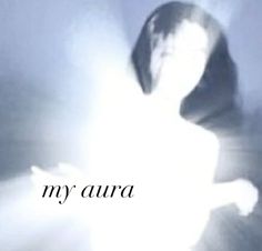 a blurry image of a dog with the words my aura in front of it