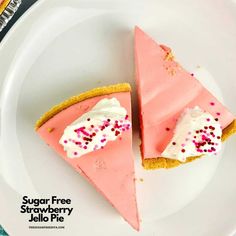 two slices of sugar free strawberry jello pie on a white plate with sprinkles