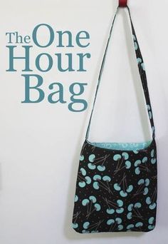 the one hour bag sewing pattern is on display in front of an advertisement for it