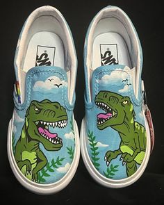 Dinosaur/t-rex themed hand painted kids vans **Please be sure of your size when ordering. No returns, exchanges or refunds as each pair is custom handmade.** **No way affiliated or endorsed with the companies, subsidiaries or affiliates of any of the content I paint on the shoes** Q. What is your turn around time? A. Usually I have many orders at one time so I do ask for UP TO 3 WEEKS to have the time to order the shoes, work on them in order received and drop them off with USPS. Q. Do you do re Shoe Painting Ideas Vans, Dinosaur Shoes, Painted Shoes Diy, Custom Sneakers Diy, Painted Canvas Shoes, Painted Vans, Custom Painted Shoes, Custom Shoes Diy, Skater Shoes