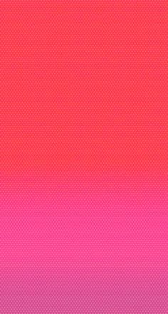 an orange and pink background with small dots