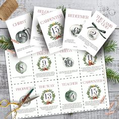 four christmas cards with scissors and twine on them