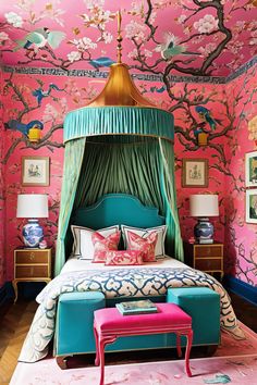 a bedroom decorated in pink, blue and green with a canopy bed surrounded by cherry blossom wallpaper