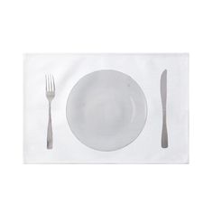 a white place setting with silverware on it