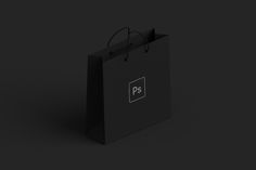 a black shopping bag with the letter p5 on it's front and side