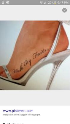 a woman's foot with a tattoo that reads, make my tattoos on it