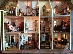 a doll house is shown with all the furniture and accessories in it's display case