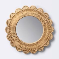 a mirror that is made out of wicker