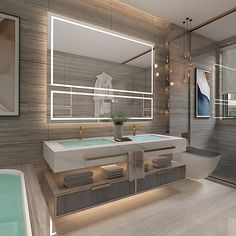 a bathroom with a tub, sink and large mirror above the bathtub is illuminated by lights