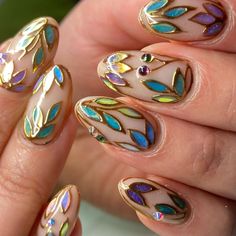 Can’t get enough of this set/design. They remind me of stained glass, or enamelled flowers. I used more colours in this set as a… | Instagram Stained Glass Manicure, Asa Bree Nails, Glass Stained Nails, Nail Art Vitrail, Color Pallet Nails, Different Hand Color Nails, Stain Glass Window Nails, Stained Glass Nails Designs, Green Theme Nails