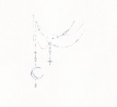 a drawing of a crescent, star and moon hanging from the side of a white wall