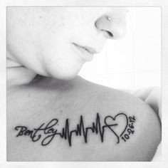 a woman with a tattoo on her shoulder that says, battle for my heart today