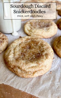 Sourdough snickerdoodle cookies on parchment paper. Sourdough Discard Toaster Strudel, Overnight Sourdough Cookies, What To Do With Discarded Sourdough, Sourdough Discard Snickerdoodle, Snickerdoodle Sourdough Cookies, Discard Cookies Easy, Sourdough Discard Snickerdoodles, Sourdough Discard Snickerdoodle Cookies, Sourdough Treats Recipes