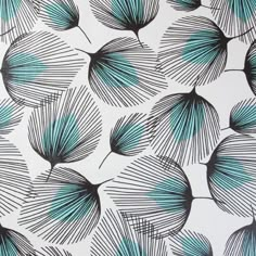 an image of blue and black leaves on a white wallpaper background, with lines in the middle