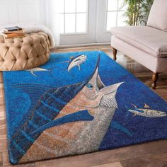 a blue rug with fish on it in a living room