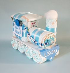 a toy train that is made out of toilet paper and other items on top of it