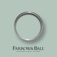 a close up of a wedding ring with the words farrow and ball written on it