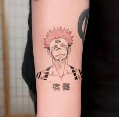 a person with a tattoo on their arm that has an anime character drawn on it