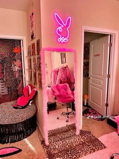 a bedroom with pink walls and animal print rugs