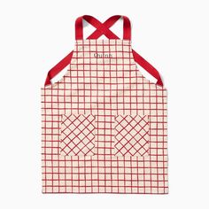 a red and white checkered apron on a white background