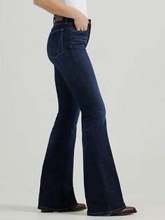 Turn up the volume and give those curves the love they deserve with our Women’s Wrangler® Bespoke High-Rise Flare Jean. We've made the vintage-inspired style even more flattering with a silhouette and angled back pockets to accentuate your shape. These new and improved bell-bottoms also come with a contoured waistband that eliminates gapping. Plus, the signature “W” pocket stitching and logo patch for an extra dose of authenticity. Our new Wrangler Bespoke Collection features superior stretch an Short Uggs, Turn Up The Volume, Pocket Stitching, Western Boots For Men, Boot Jewelry, Work Boots Men, Jumpsuit Jacket, Wrangler Jeans, Turn Up