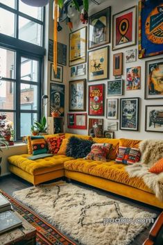 a living room filled with lots of pictures on the wall and a yellow couch sitting in front of a large window